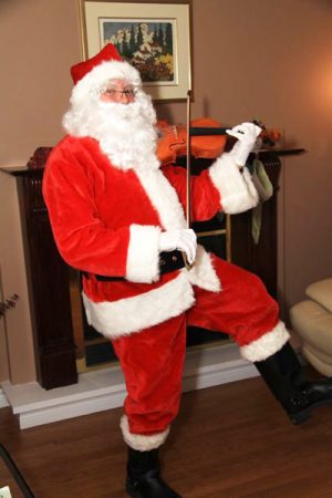Santa plays the violin!